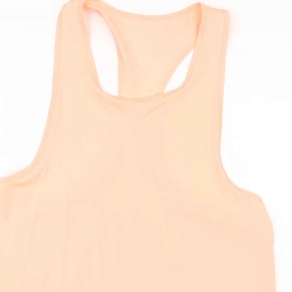 Close-up detail of women’s orange basic tank, size UK 14
