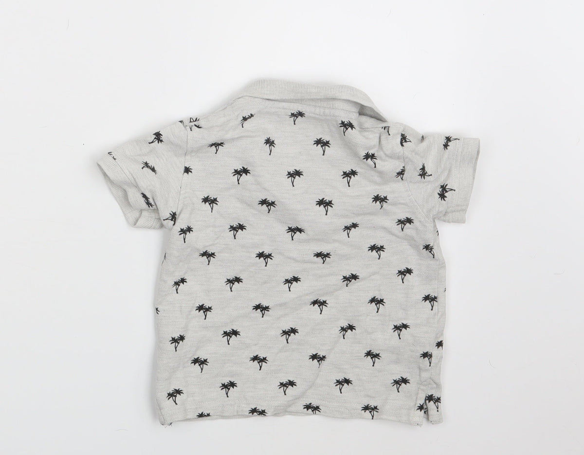 Back view of Primark boys’ grey floral basic polo, size 12-18, months