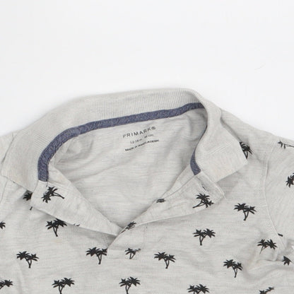 Close-up detail of Primark boys’ grey floral basic polo, size 12-18, months