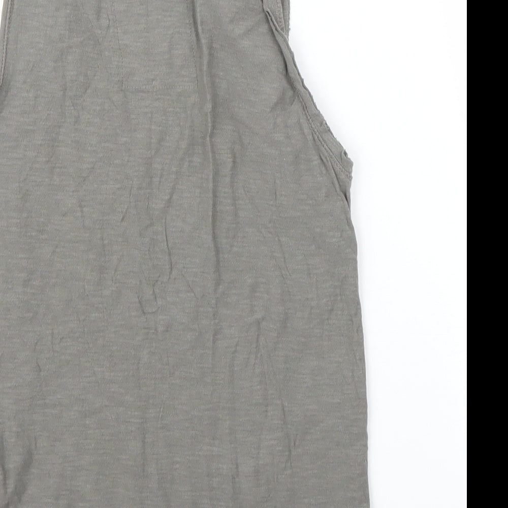 Brand and care label for Zara girls’ green basic blouse, size 6, years