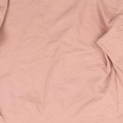 Brand and care label for Just Hoods women’s pink pullover sweatshirt, size M