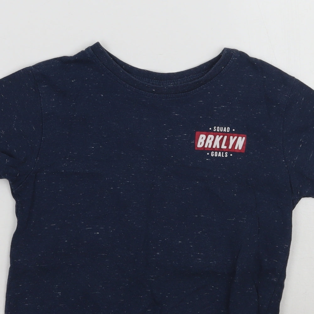 Close-up detail of Primark boys’ blue basic t-shirt, size 5-6, years