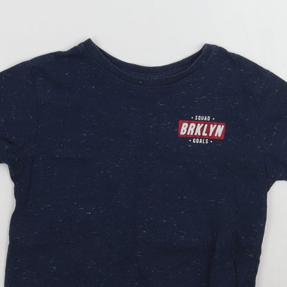 Close-up detail of Primark boys’ blue basic t-shirt, size 5-6, years