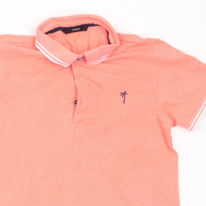 Close-up detail of George girls’ orange basic polo, size 10-11, years - palm tree logo
