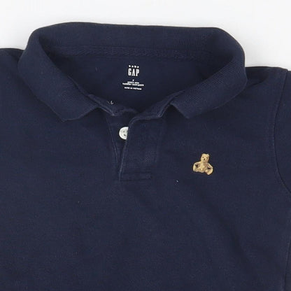 Close-up detail of Gap boys’ blue basic polo, size 2, years