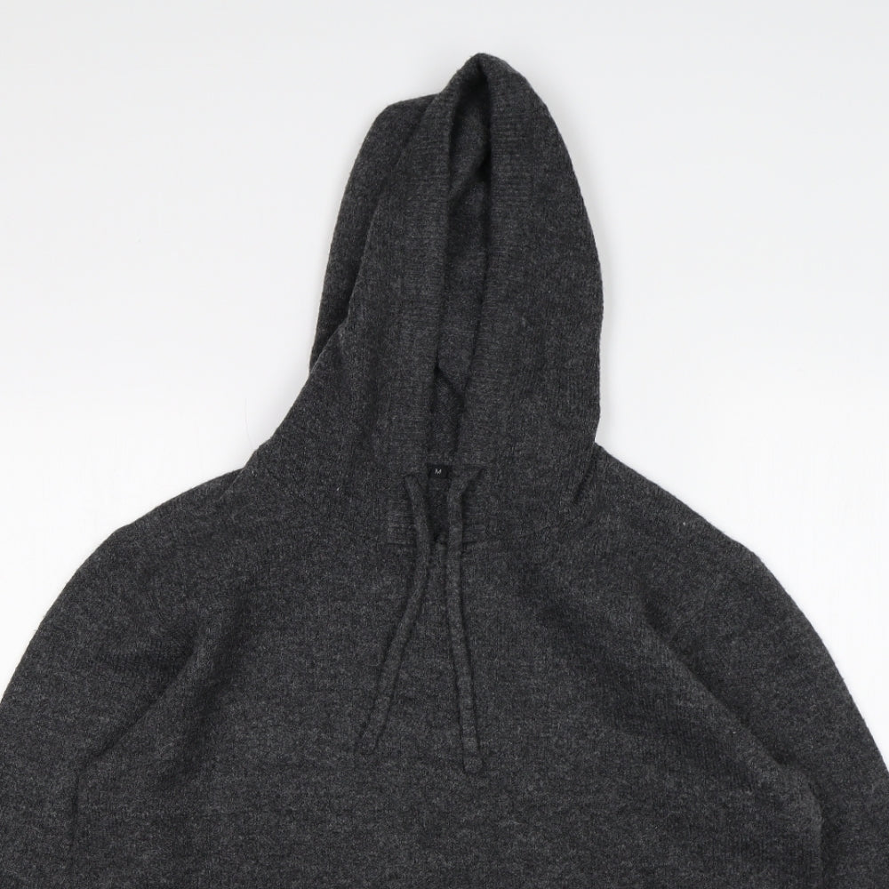 Close-up detail of women’s grey pullover hoodie, size M