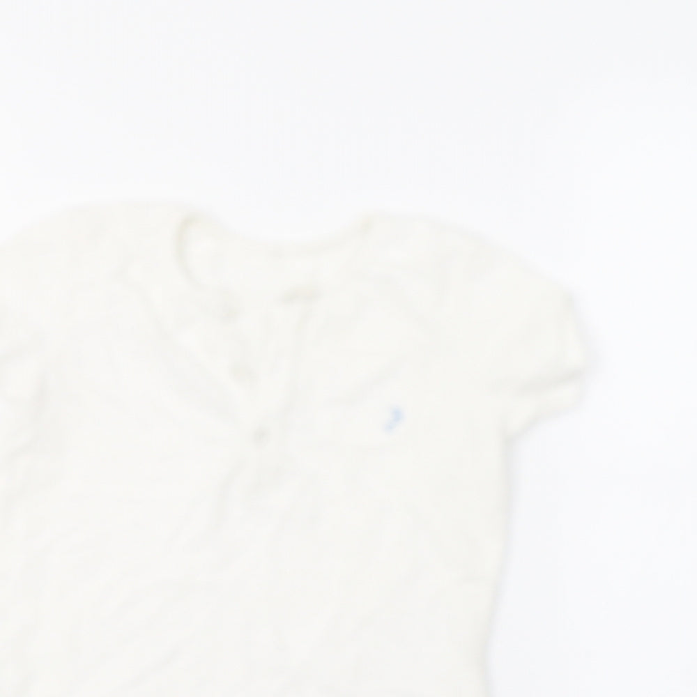 Close-up detail of George boys’ white basic polo, size 3-4, years
