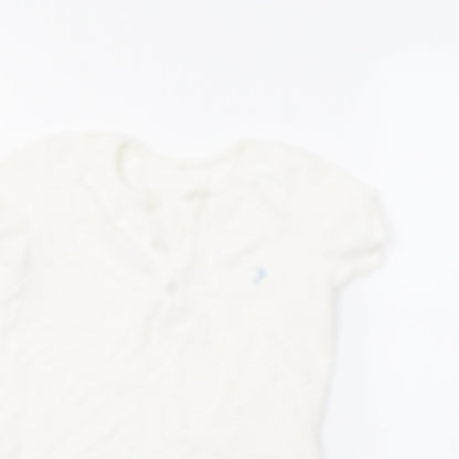 Close-up detail of George boys’ white basic polo, size 3-4, years