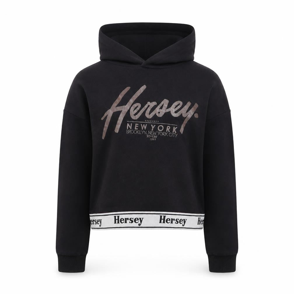 Front view of Hersey girls’ black pullover hoodie, size 10-11, years