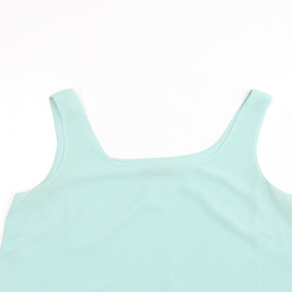 Close-up detail of decisions women’s green basic blouse, size UK 16