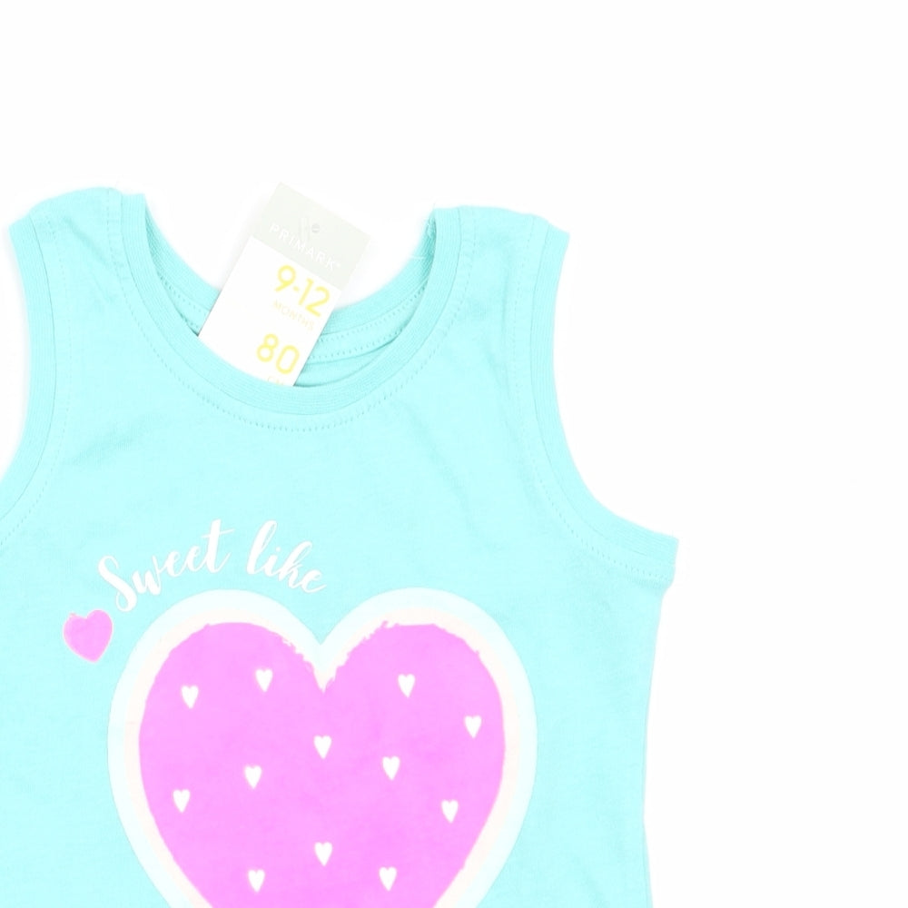 Close-up detail of Primark girls’ blue basic tank, size 9-12, months