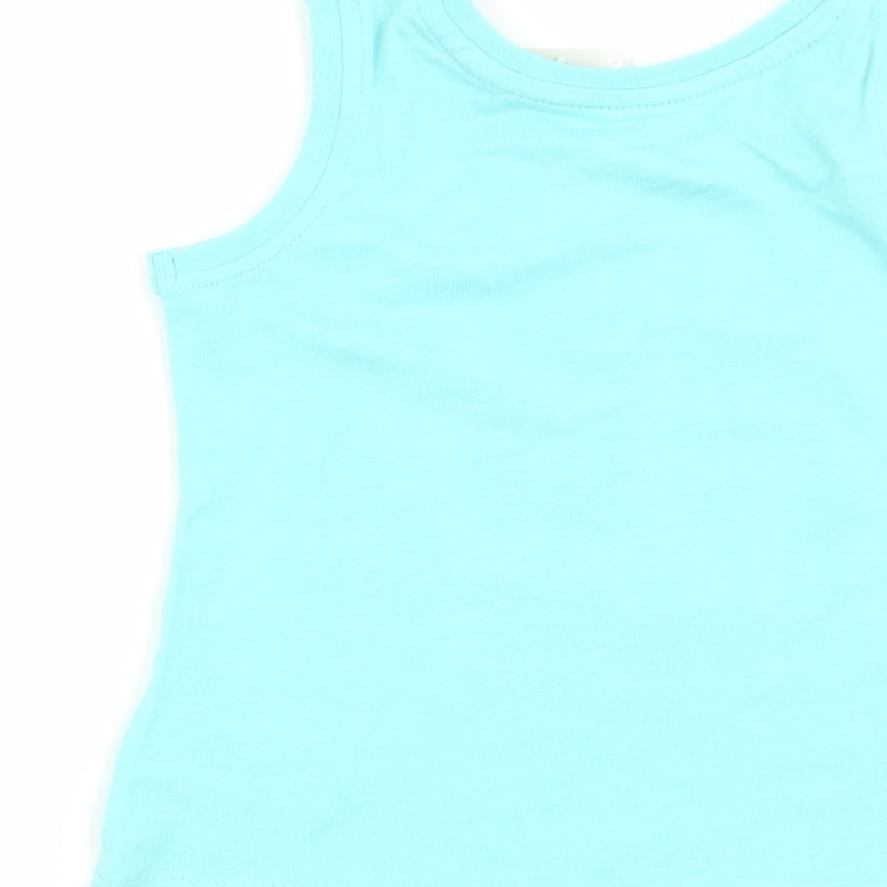 Brand and care label for Primark girls’ blue basic tank, size 9-12, months