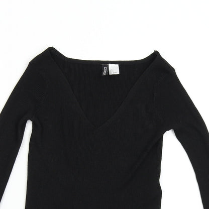 Close-up detail of H&M girls’ black knit jumper, size S