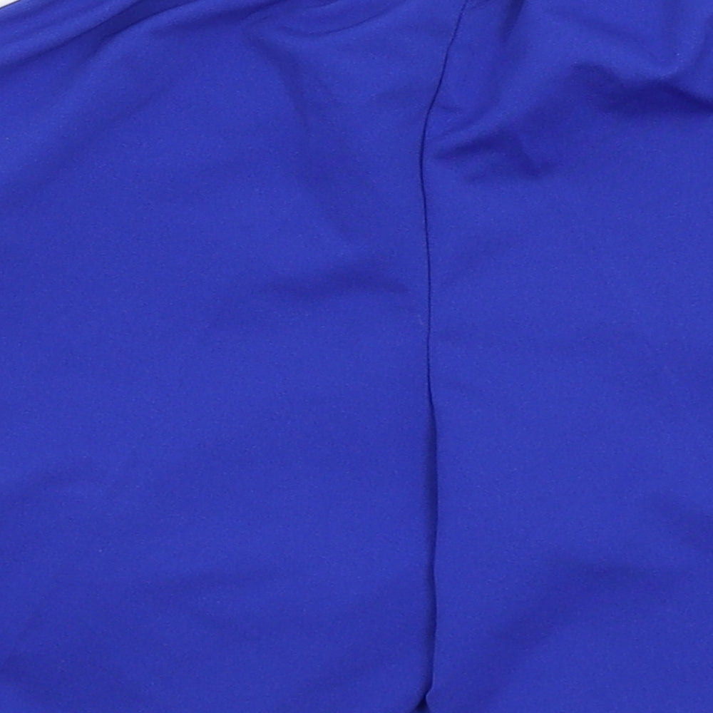 Brand and care label for FB Sister boys’ blue bermuda shorts, size 10, years