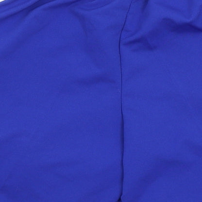 Brand and care label for FB Sister boys’ blue bermuda shorts, size 10, years