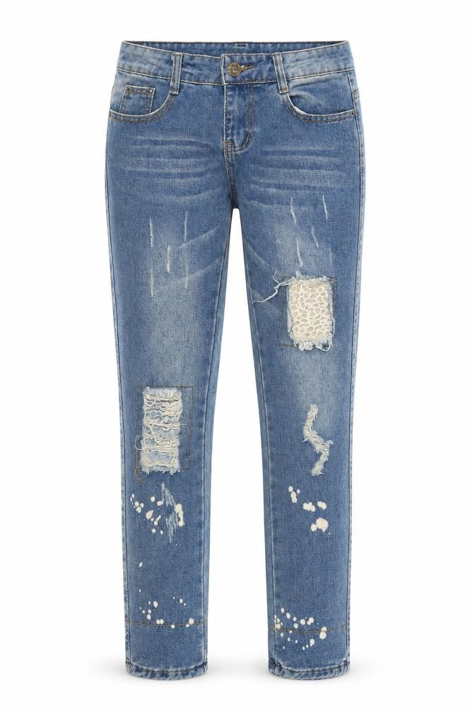 Front view of women’s blue animal print denim skinny jeans, size S, 28-inch leg - leopard print