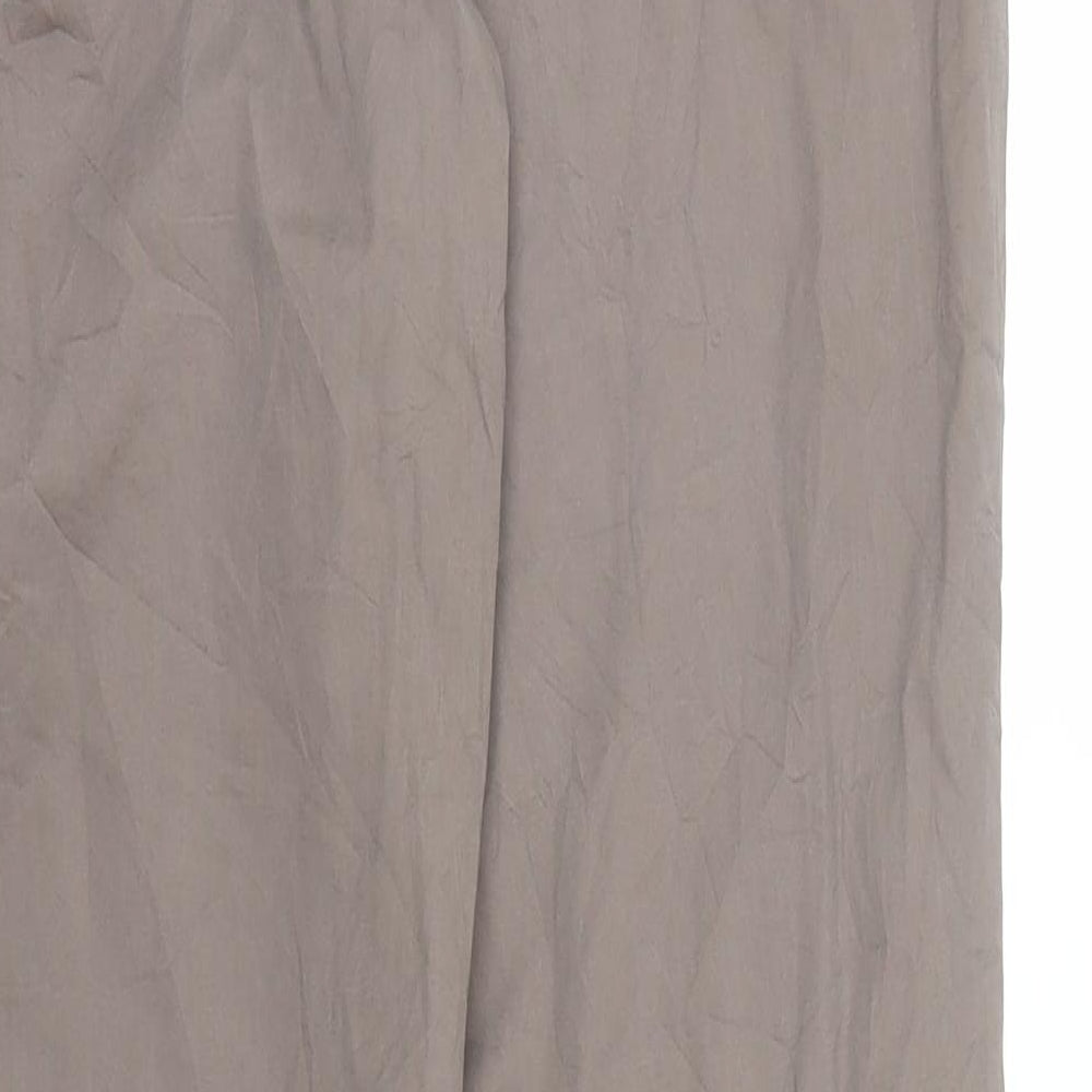 Brand and care label for Zero women’s brown carpenter trousers, size UK 10, 30-inch leg