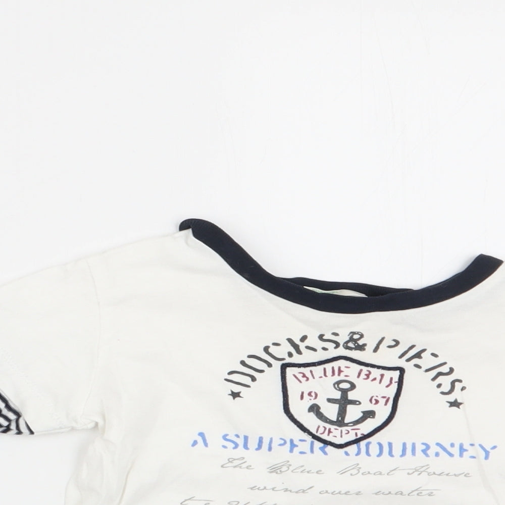 Close-up detail of Beneton boys’ ivory striped basic casual, size 9-12, months - docks & piers