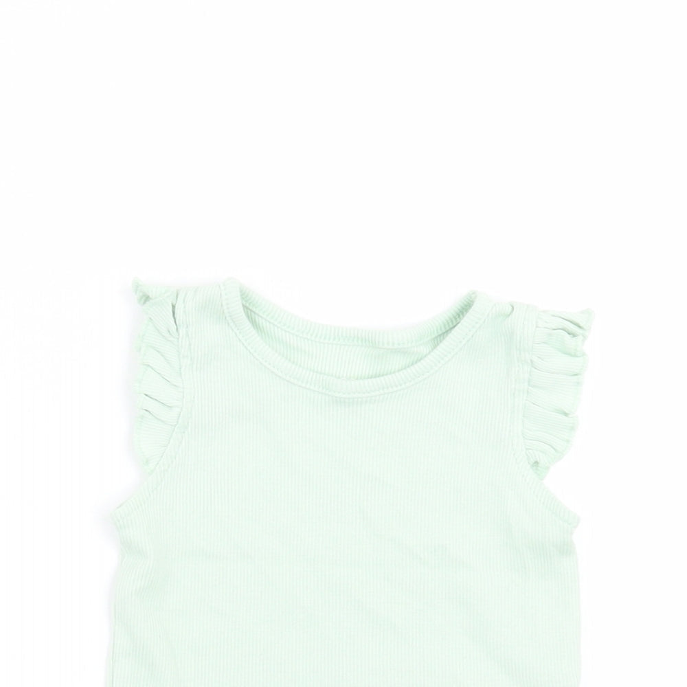 Close-up detail of Primark Baby Green Basic T-Shirt, size 6-9, Months