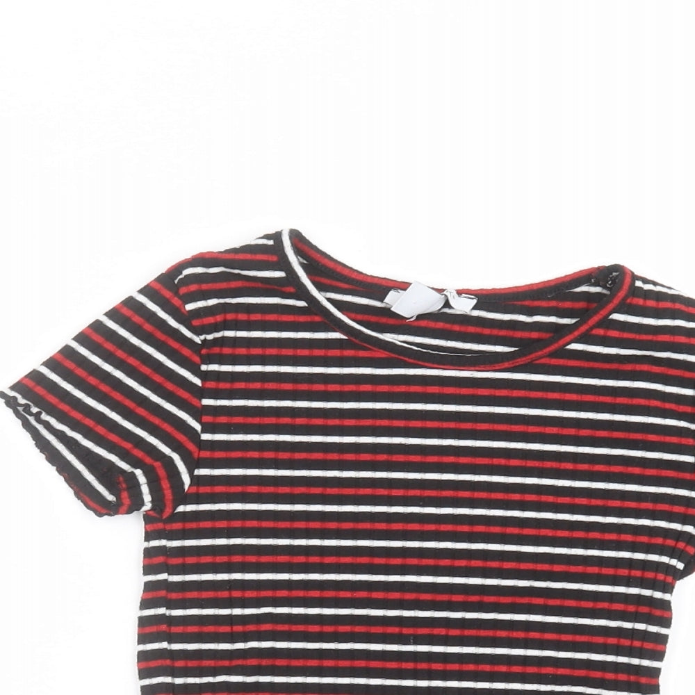 Close-up detail of Primark boys’ black striped basic t-shirt, size 8-9, years
