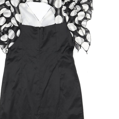 Brand and care label for Explosion women’s black polka dot bodycon, size UK 10