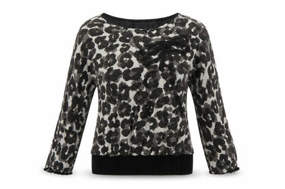 Front view of vegas women’s brown animal print jumper, size M