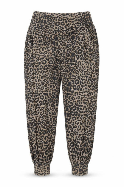 Front view of Preworn women’s brown animal print trousers, size UK 16, 29-inch leg