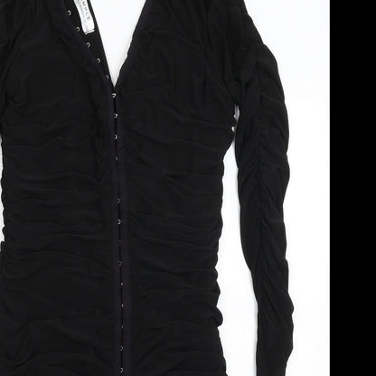 Close-up detail of Sample women’s black bodycon, size S