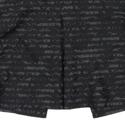 Brand and care label for NAF NAF women’s black jacket, size UK 6