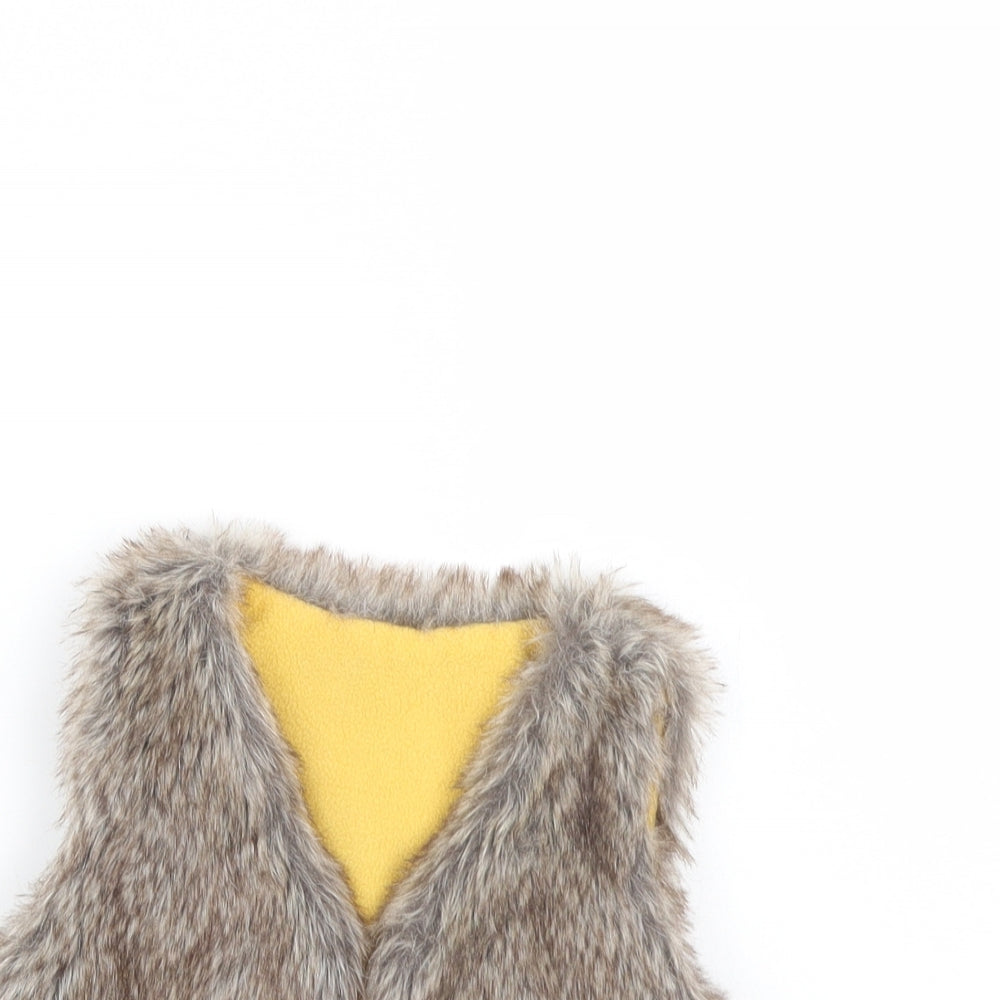 Close-up detail of Preworn girls’ brown jacket, size 2, years