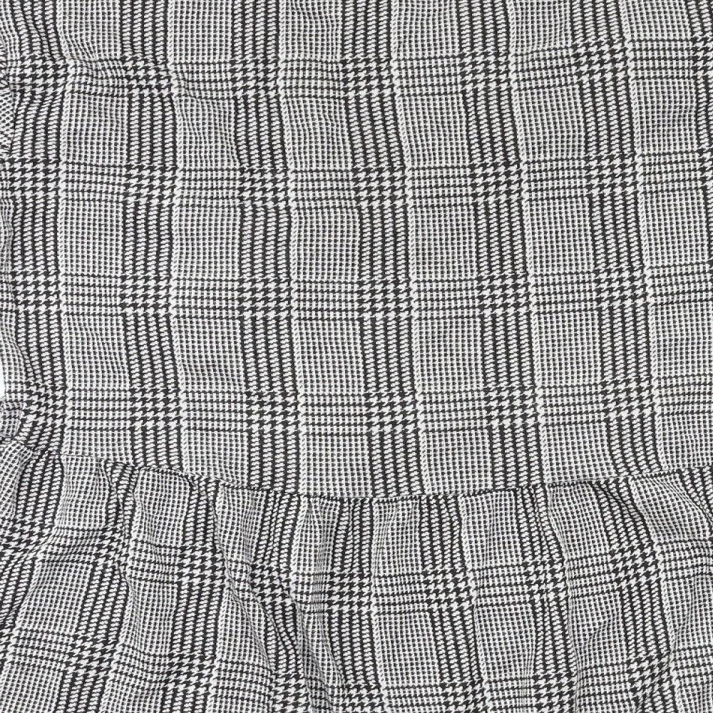 Brand and care label for Zara Trafaluc women’s grey check basic blouse, size S