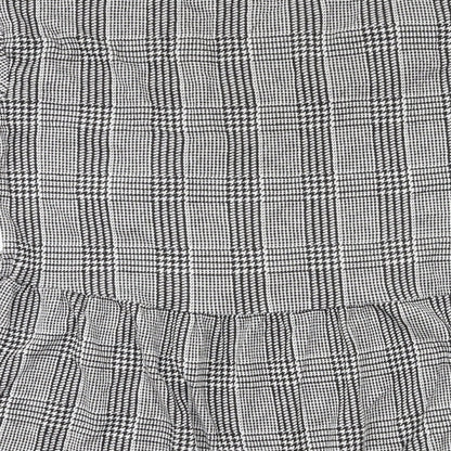 Brand and care label for Zara Trafaluc women’s grey check basic blouse, size S