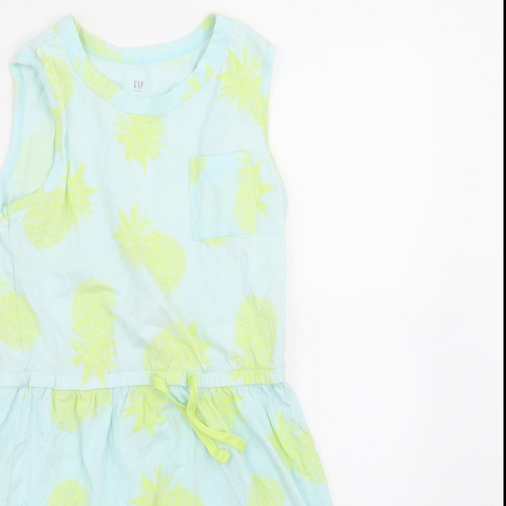 Close-up detail of Gap girls’ blue polka dot a-line, size M