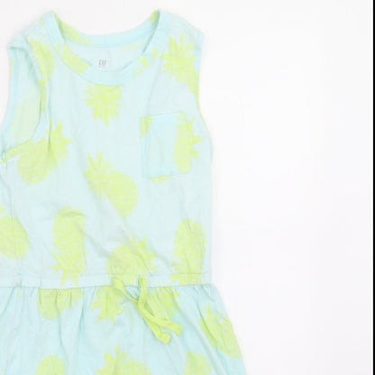 Close-up detail of Gap girls’ blue polka dot a-line, size M