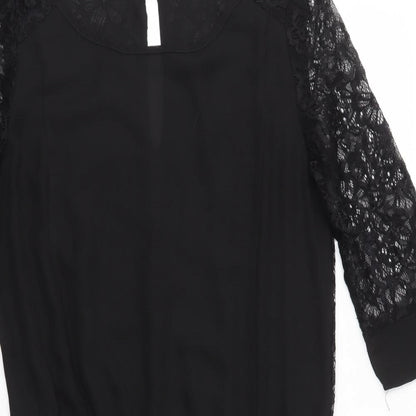 Close-up detail of Millenium women’s black a-line, size S