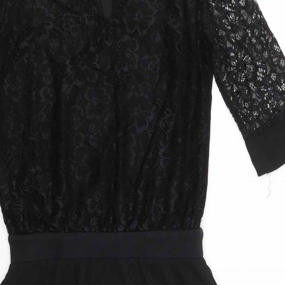 Brand and care label for Millenium women’s black a-line, size S