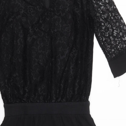 Brand and care label for Millenium women’s black a-line, size S