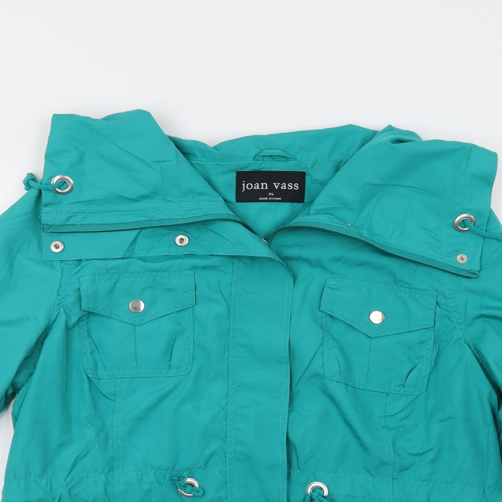 Close-up detail of Joan Vass women’s green jacket, size XL
