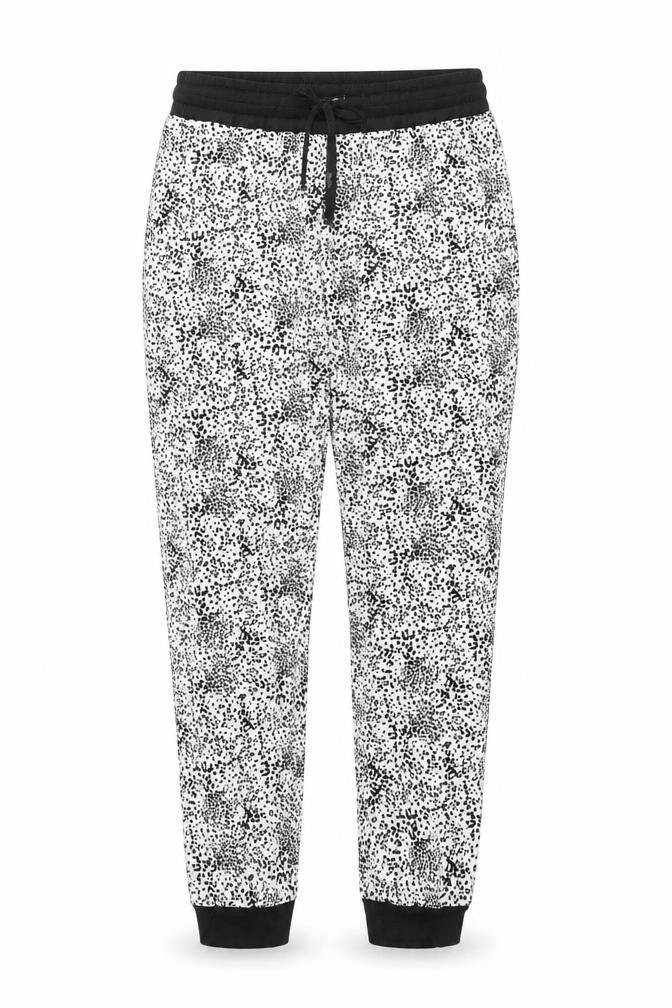 Front view of Primark women’s white polka dot trousers, size M, 27-inch leg