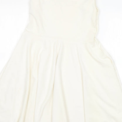 Brand and care label for CAT women’s white a-line, size UK 12