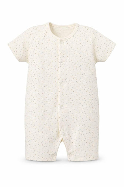 Front view of George girls’ beige spotted romper one-piece, size 9-12, months