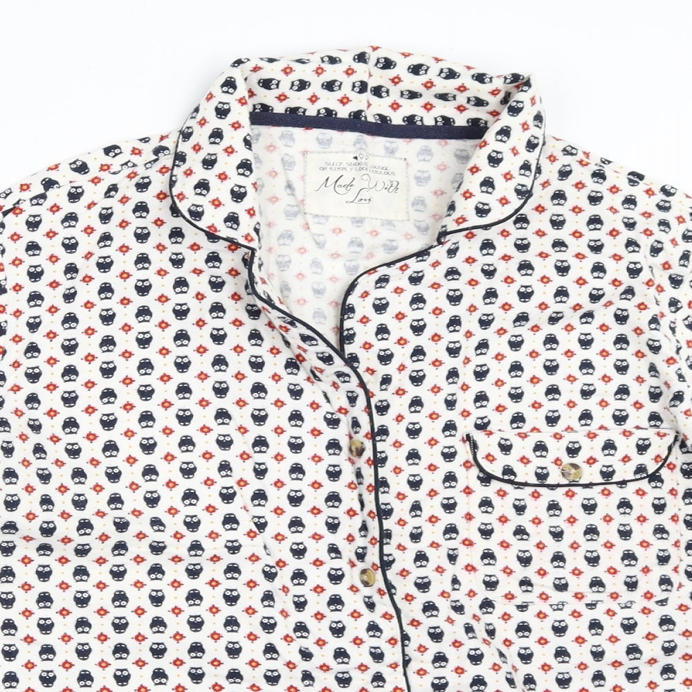 Close-up detail of Matalan women’s ivory solid top pyjama top, size UK 12