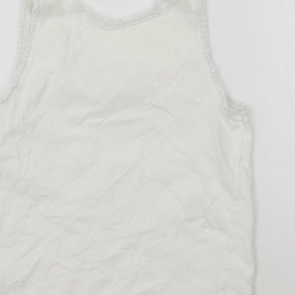 Brand and care label for KidsOwn girls’ white basic tank, size 3-4, years