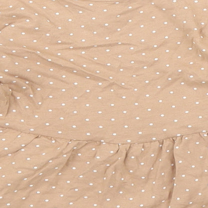 Brand and care label for George girls’ brown polka dot basic t-shirt, size 6-9, months