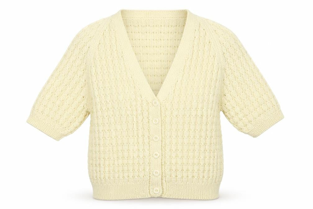 Front view of Preworn women’s white knit cardigan jumper, size UK 10