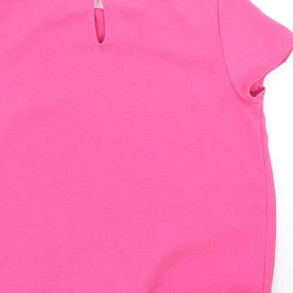 Brand and care label for George girls’ pink basic blouse, size 10, years