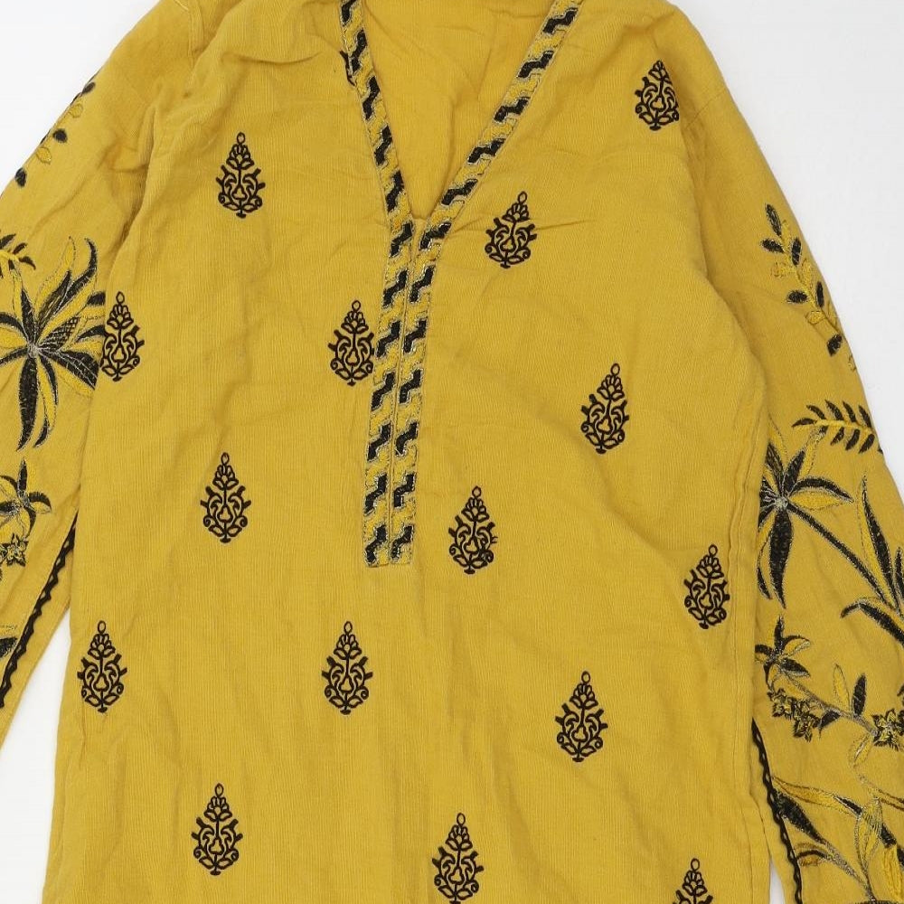 Close-up detail of Jacquard women’s yellow geometric basic blouse, size S