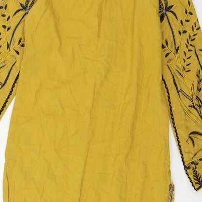 Brand and care label for Jacquard women’s yellow geometric basic blouse, size S