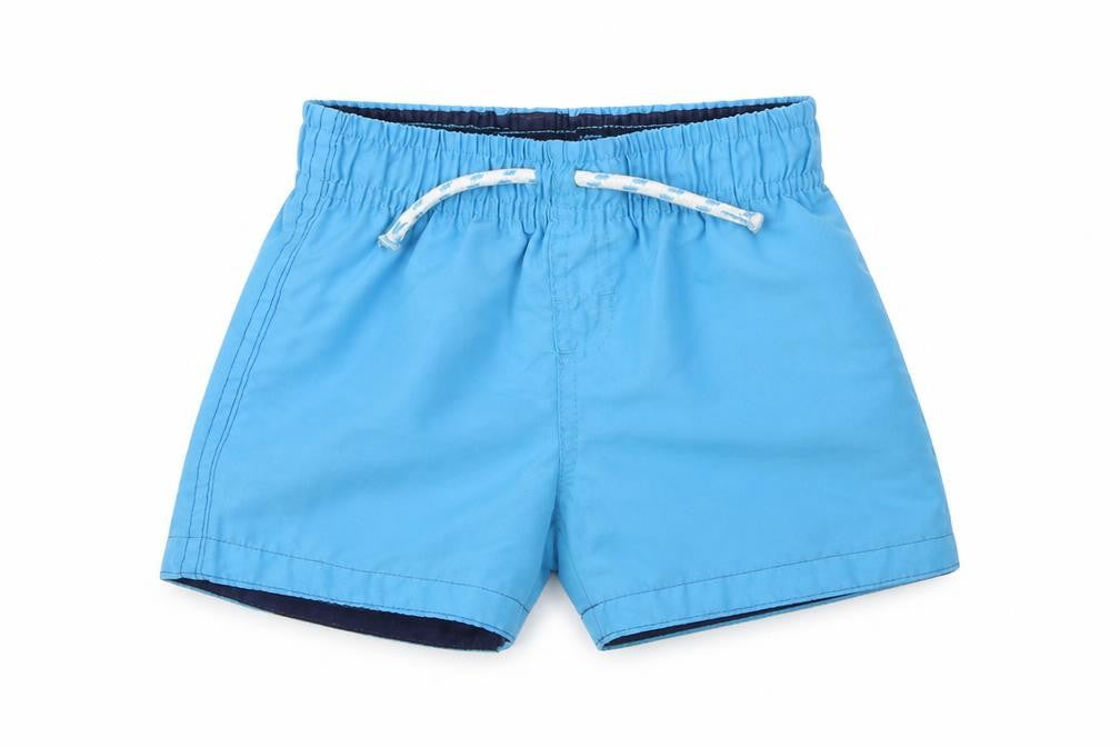Front view of Primark boys’ blue cropped trousers, size 18-24, months