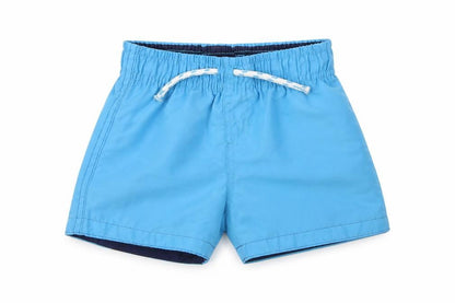 Front view of Primark boys’ blue cropped trousers, size 18-24, months